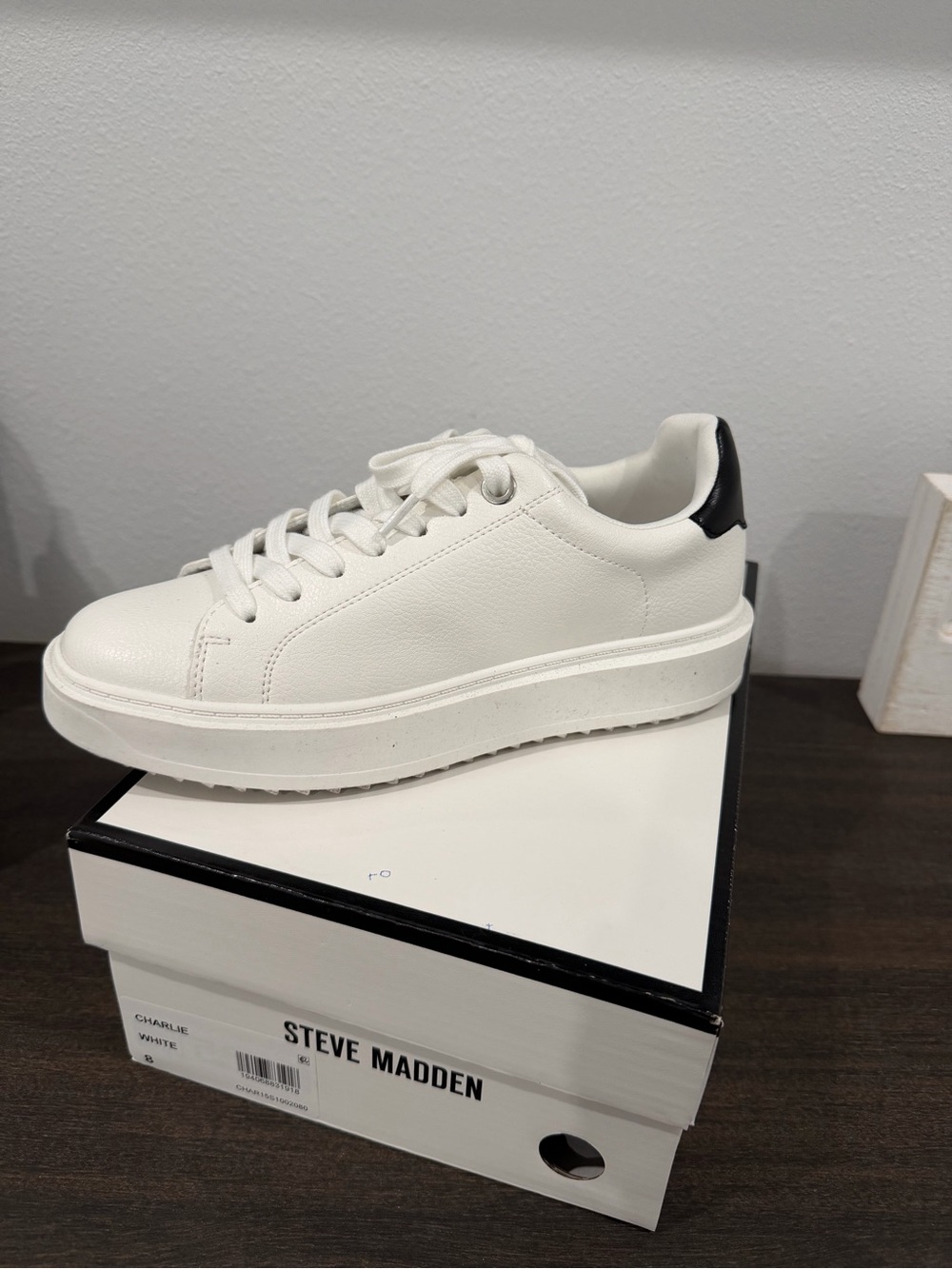 Steve Madden White Low-Top Leather Sneaker with Black Heel Accent